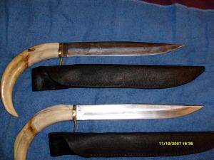 Dennis Rohner's custom warthog tusk knives