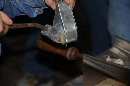 Soldering handle rivets