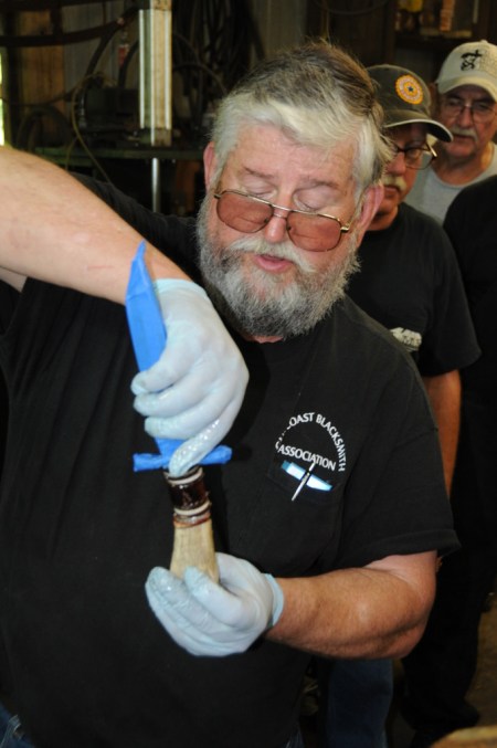Inverting tang into the glue-filled antler