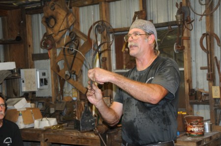 Tom arranges the cattail leaves