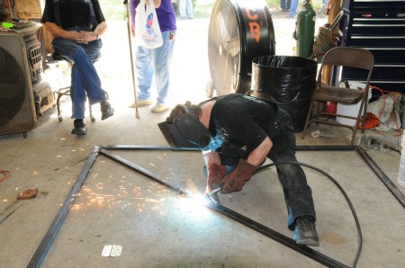 Wayne welding a door brace
