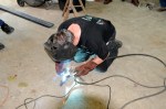 Wayne welds guide pieces on Jakob's sliding bolt