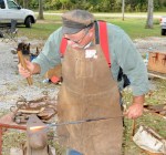 Tim LeMien pounds iron